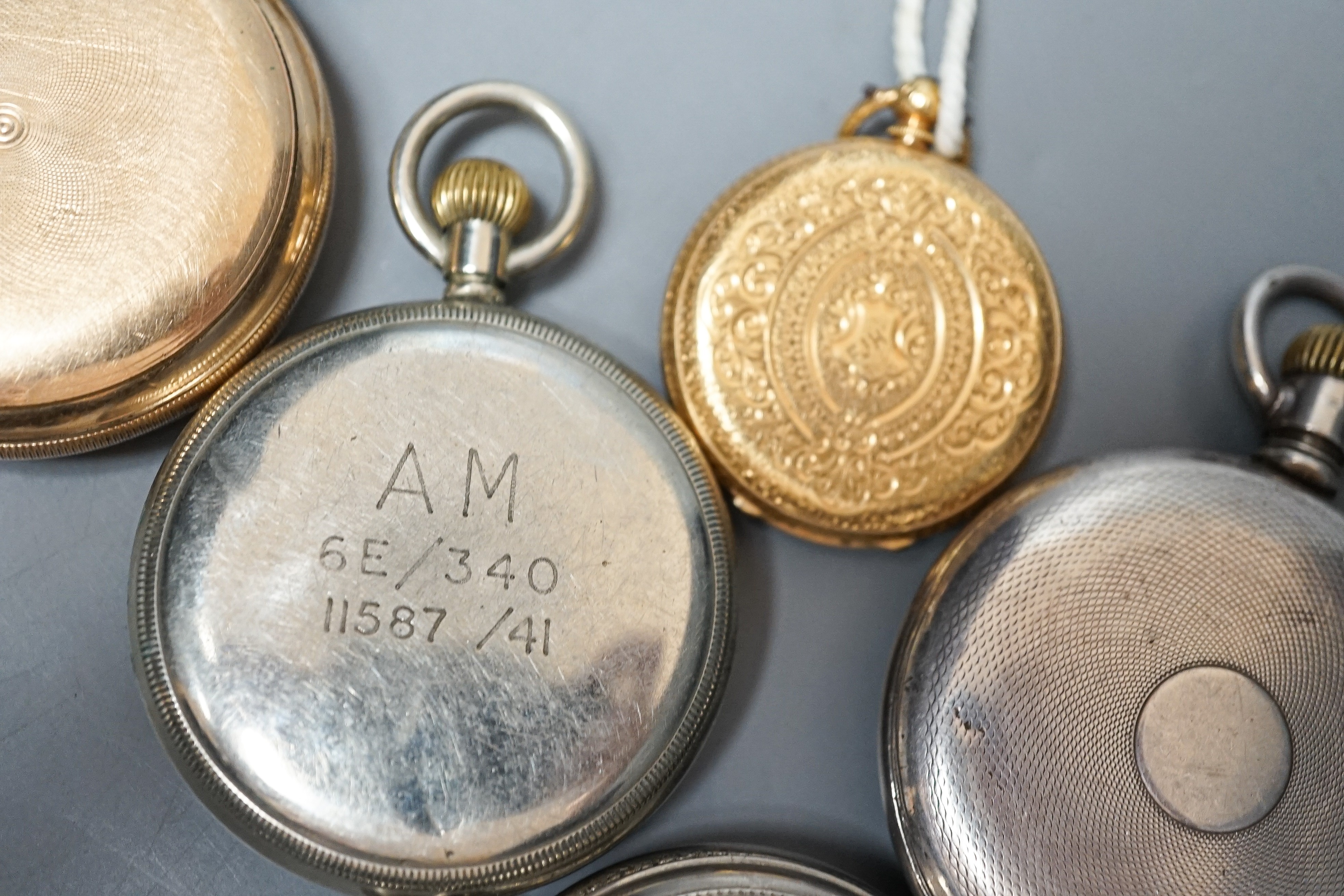 A collection of assorted pocket watches, including 1940's military, an 18k fob watch (gross 40.2grams), gold plated and engine turned Swiss 935 white metal.